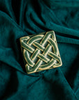 This Journey Knot Tile features the matte organic green Leaf glaze.