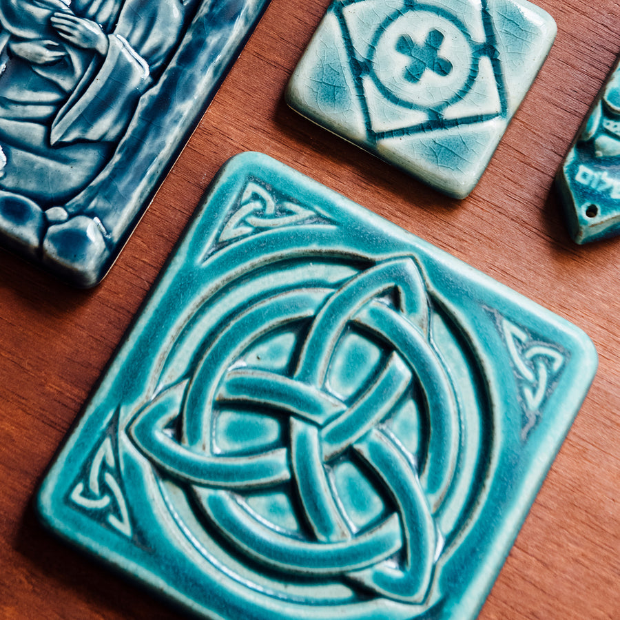 This tile features the matte turquoise Pewabic Blue glaze.