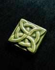 This Lover's Knot Tile features the matte bright light green Lime glaze.